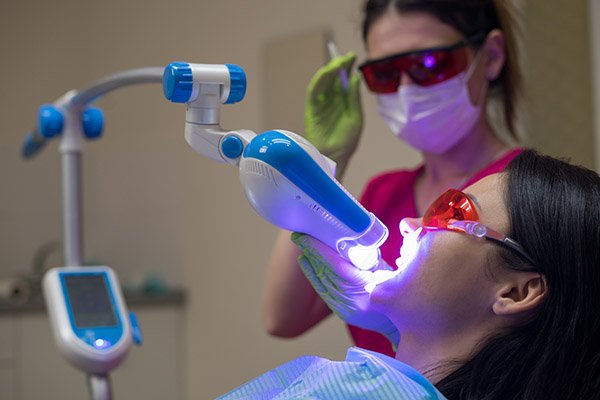 laser teeth whitening and crowns fillings and implants